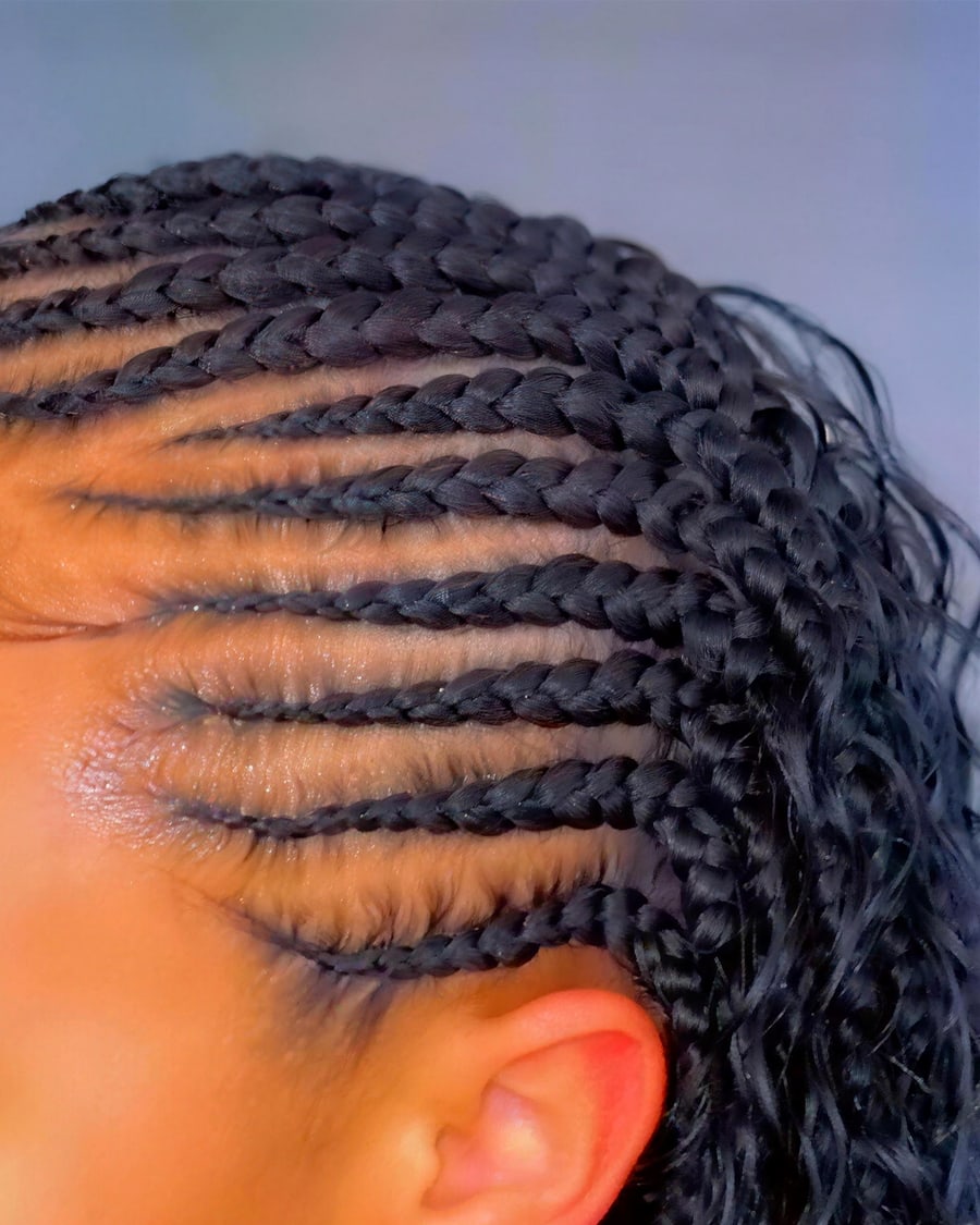 Close detail of straight-back cornrows showing even tension and clean sections